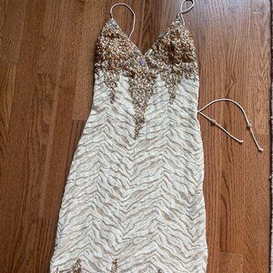 Sexy gold-embellished, cream tiger-lace dress